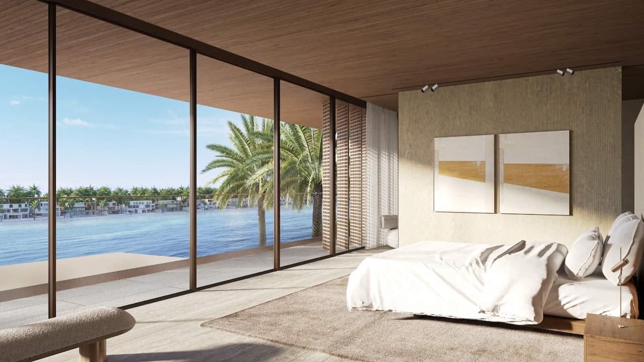 Master suite in a Palm Jebel Ali villa with floor-to-ceiling sea views